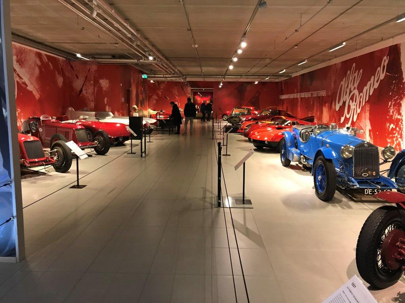 Loadsa red cars. And a blue 1933 Alfa Romeo 8C 2300 Le Mans car, raced by Scuderia Ferrari in their first Le Mans. Interestingly, the supercharged 2.3L straight 8 engine is actually 2 4 cylinder blocks hitched together